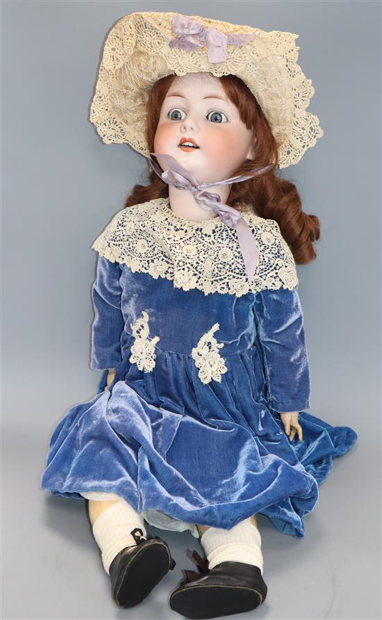 A large Heubach Koppelsdorf 350-11 bisque headed doll, open mouth and dimpled chin